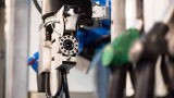 A Neste petrol station in Finland uses a robot arm to fuel people’s cars
